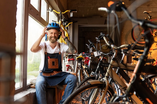 Close up on young businessman in bike shop