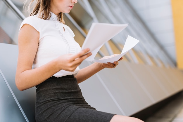 Free photo close-up of a young businessman verifying the documents