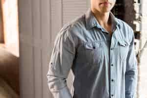 Free photo close-up of a young man in blue denim shirt