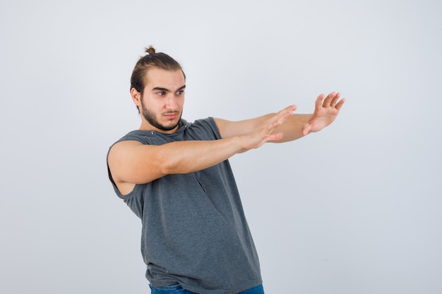 Free Photo close up on young man gesturing isolated