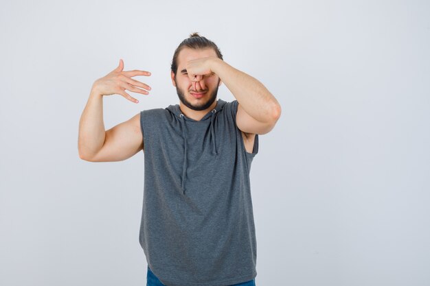 Close up on young man gesturing isolated