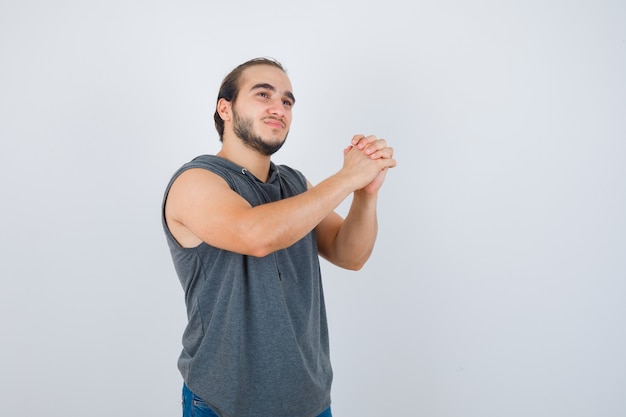 Close up on young man gesturing isolated