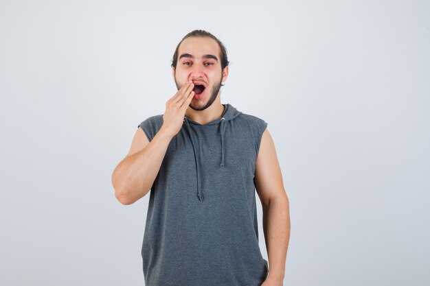 Close up on young man gesturing isolated