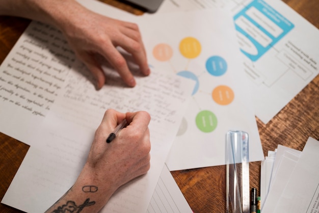 Free photo close up on young man writing in a virtual classroom