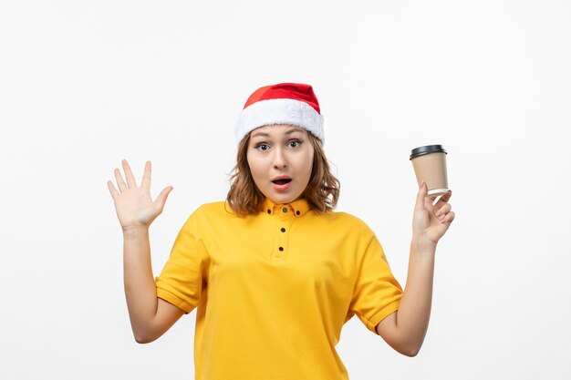 Close up on young pretty woman wearing Christmas hat isolated