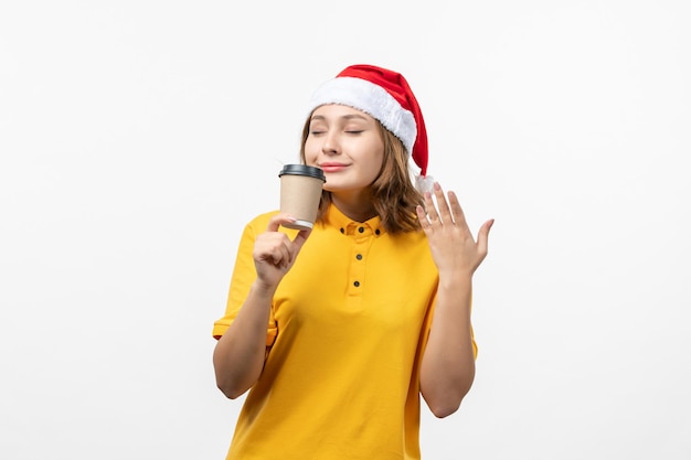 Close up on young pretty woman wearing Christmas hat isolated