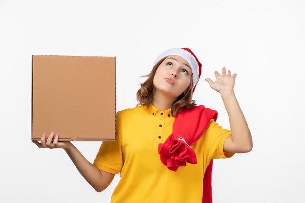 Close up on young pretty woman wearing Christmas hat isolated