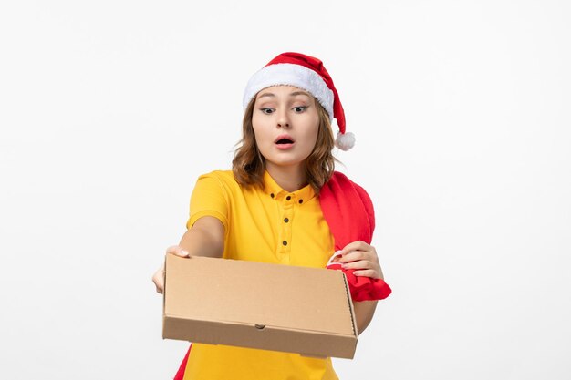 Close up on young pretty woman wearing Christmas hat isolated