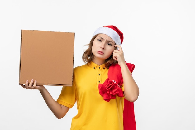 Close up on young pretty woman wearing Christmas hat isolated