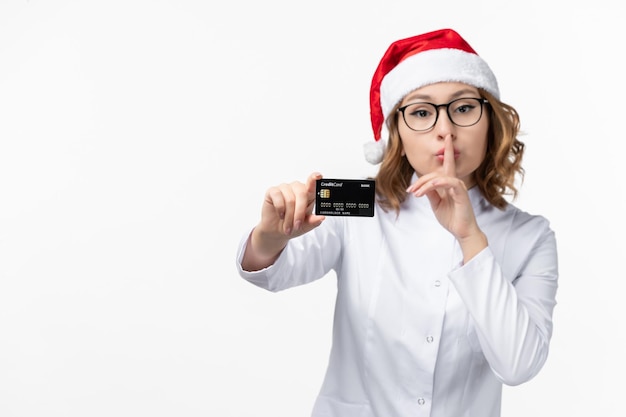 Free photo close up on young pretty woman wearing christmas hat isolated