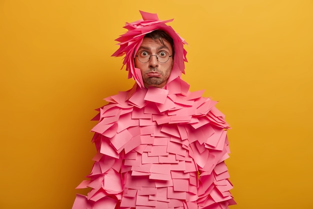 Close up on young student surrounded by sticky notes