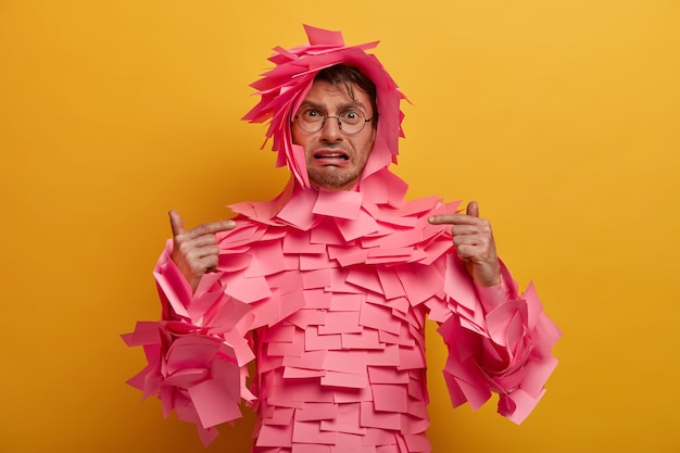 Close up on young student surrounded by sticky notes