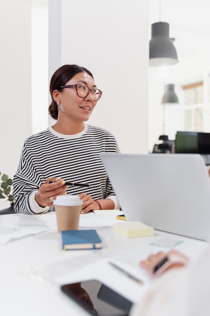 Close up on young woman having a meeting