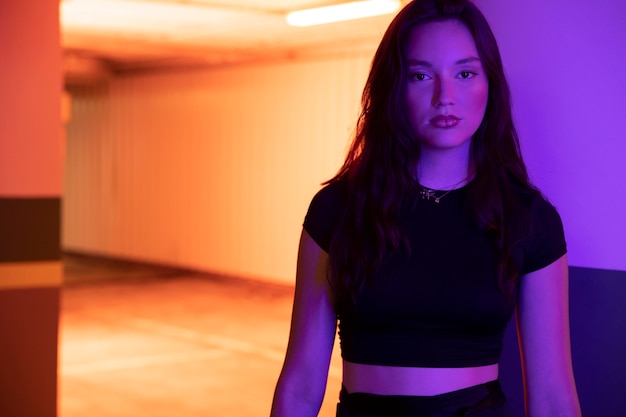 Free Photo close up on young woman posing in dramatic light