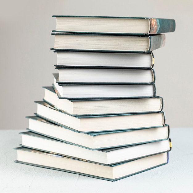 Free photo close-upclose-up spiral stacked books