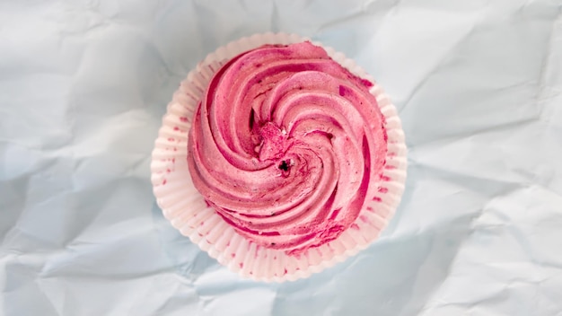 Free photo close view of a pink cake background with the texture of crumpled paper