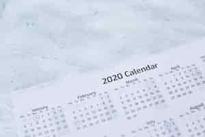 Free photo closeup of a 2020 calendar on a white textured surface