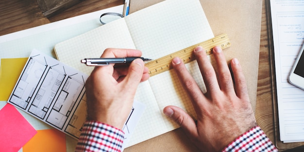 Free Photo closeup aerial view of architecture hands working with plan layout