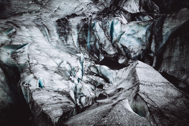 Free Photo closeup of beautiful ice texture on rocks in sólheimajökulll, iceland