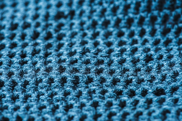 Closeup of blue wool textile texture macro