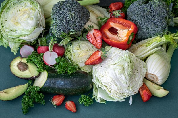 Closeup bright fresh vegetables fruits and berries