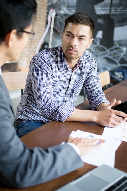 Closeup of Business Partners Negotiating