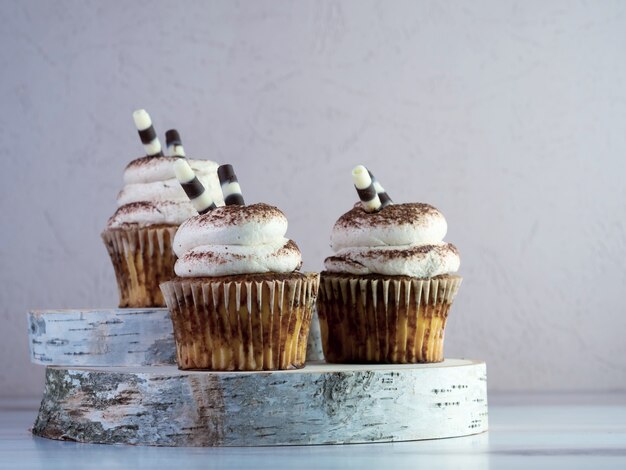 Closeup of buttercream flavored cupcakes on the table