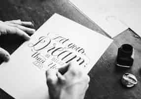 Free photo closeup of a calligrapher working on a project