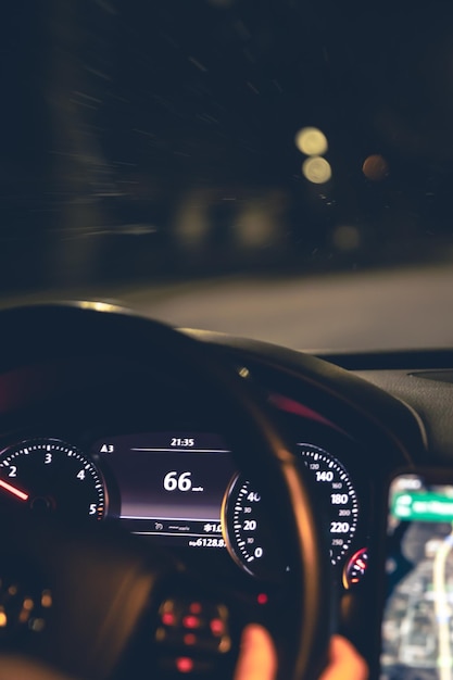 Free photo closeup car speed indicators in a car at night