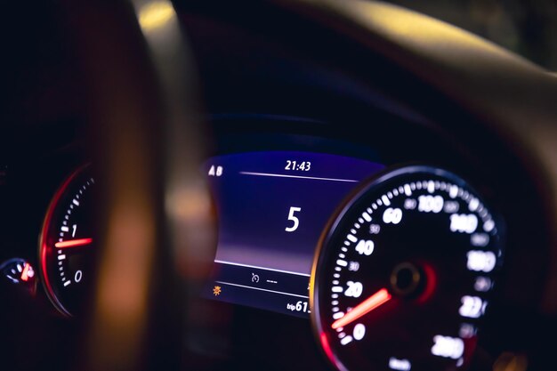 Free photo closeup car speed indicators in a car at night