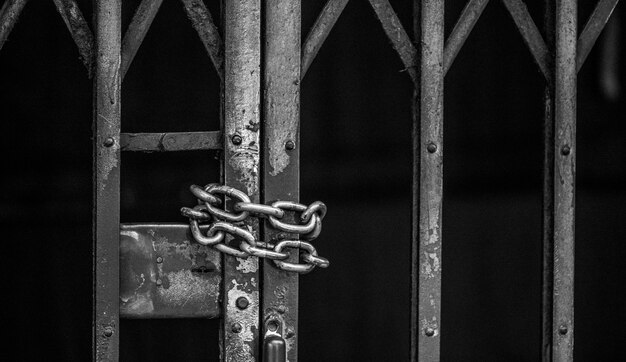 Closeup of chained sliding grille door