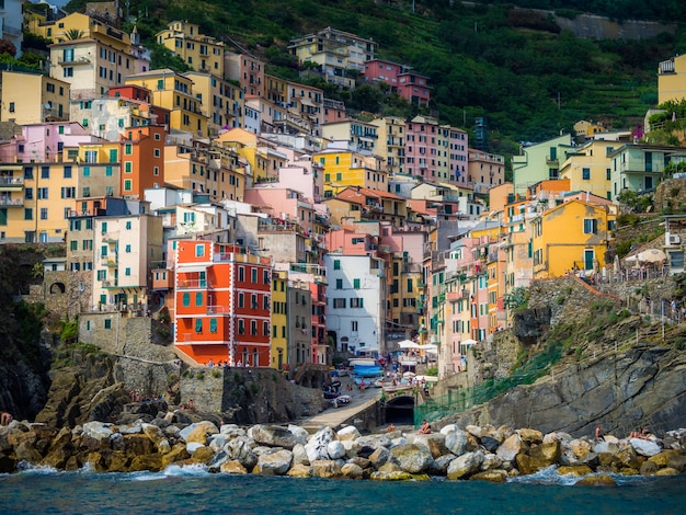 Closeup of colorful houses on the coastal village of  Riomaggiore, Italy