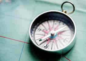 Free photo closeup of compass on the map