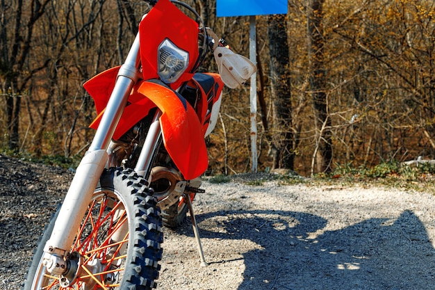 Closeup details of cross motorcycle parked on ground