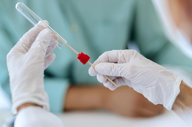 Closeup of doctor doing PCR test during COVID19 pandemic