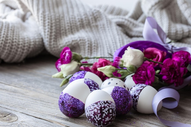 Free photo closeup of easter eggs decorated with purple sparkles