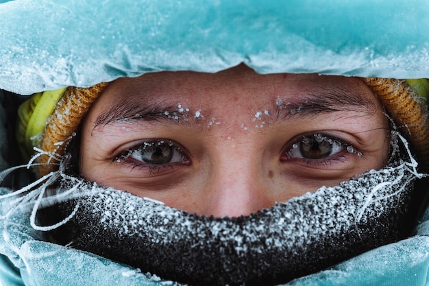 Free photo closeup of a female mountaineer in wintertime