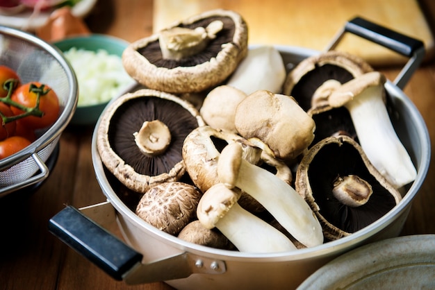 Free Photo closeup of fresh eryngii and portobello mushroom