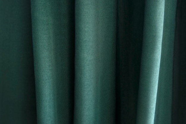 Free Photo closeup of green textile with pleats