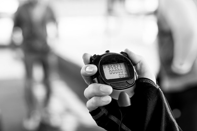 Free Photo closeup of hand holding stopwatch