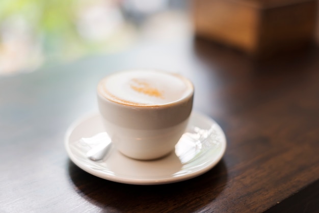 Closeup of hot drink on a wooden table