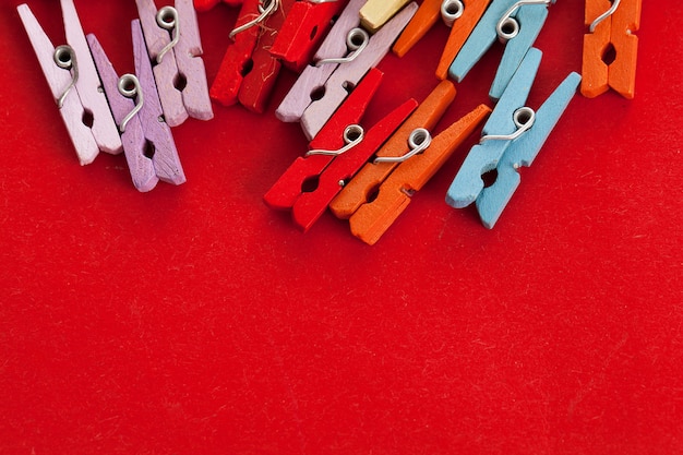 Free photo closeup image of colorful office clothespins