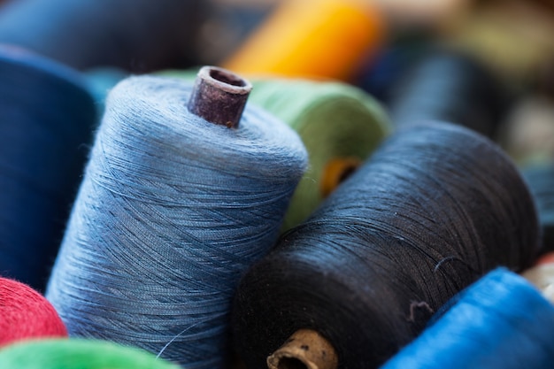 Closeup image of various colour threads