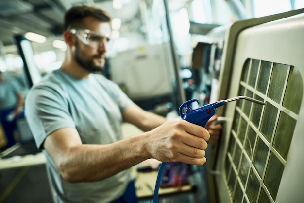 Free Photo closeup of manual worker at industrial production line facility