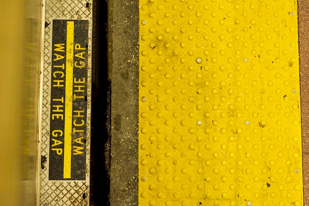 Free photo closeup metro warning sign