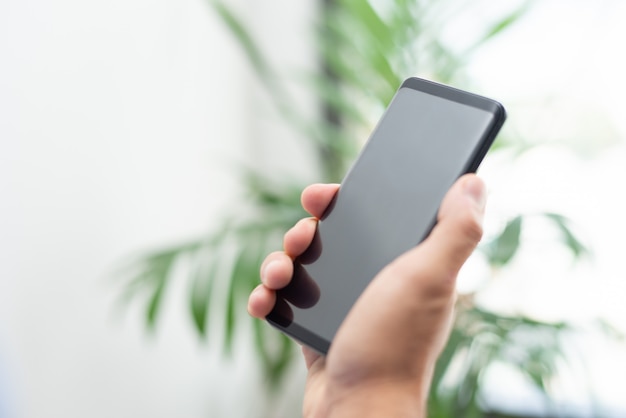 Closeup of person holding smartphone