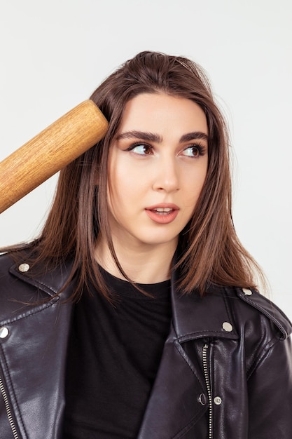 Closeup photo of young beautiful lady standing on white background