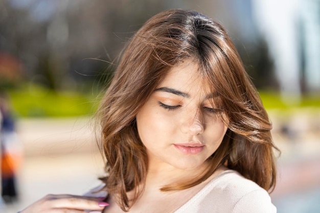 Closeup photo of young model looking down High quality photo