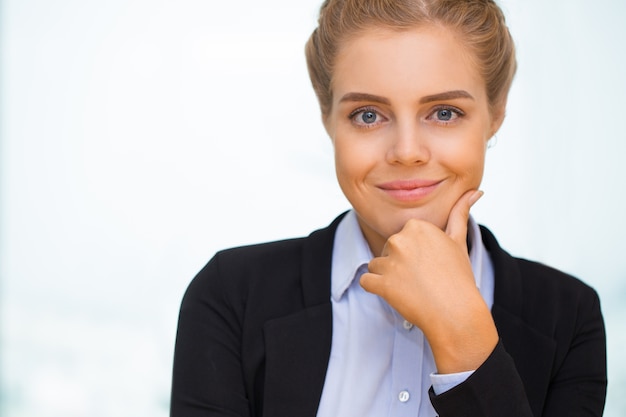 Free Photo closeup of positive fair-haired business woman