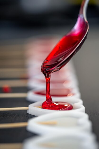 Closeup the process of making lollipops from natural ingredients